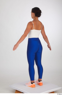 Zuzu Sweet blue leggings orange sneakers sports standing white top…